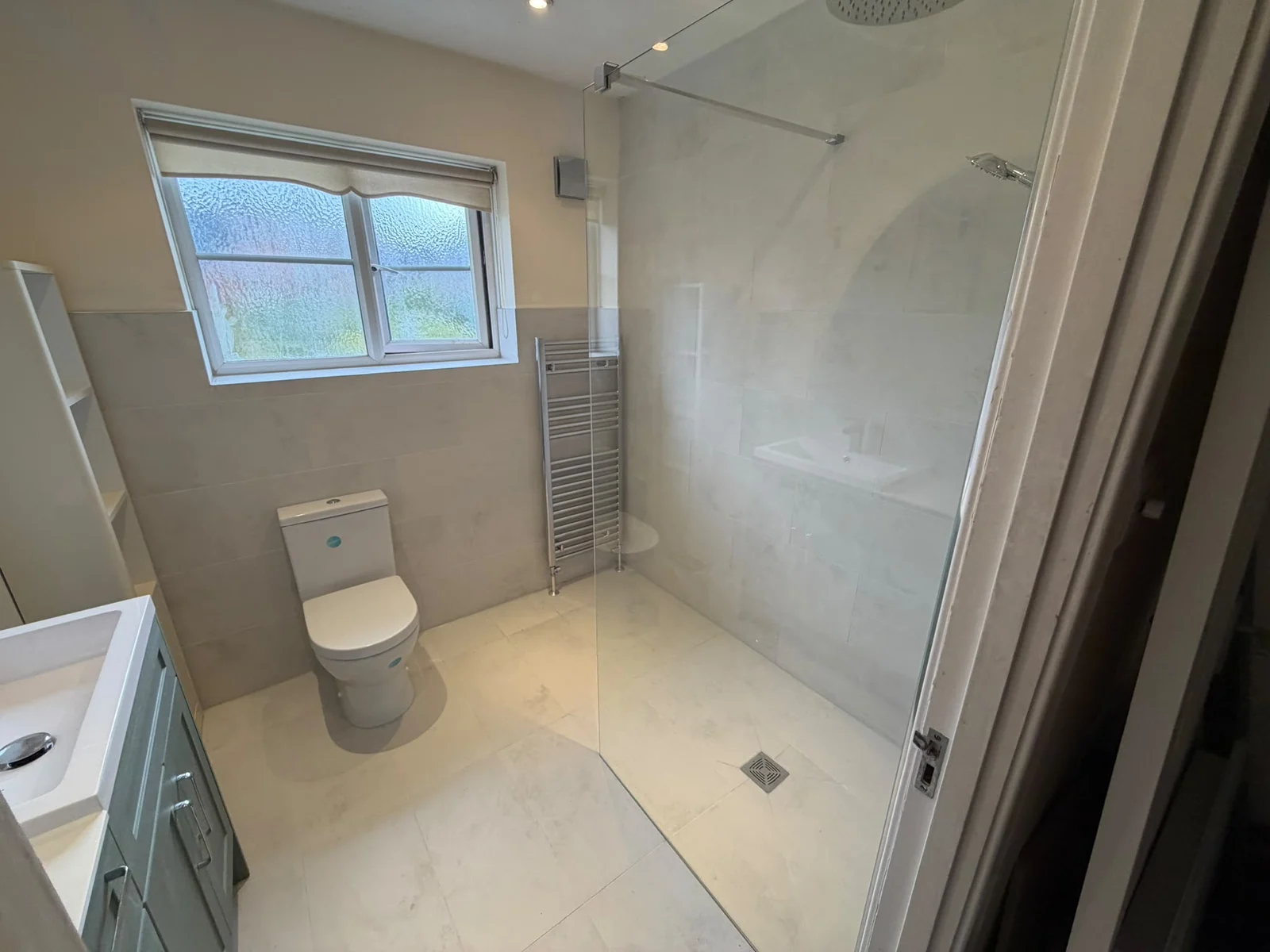 Finished tiled wet room with walk-in shower and window — RV Renovation, Oxford